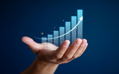 A growing business trend is showcased with a chart rising upward in a hand, suggesting success, and financial growth.