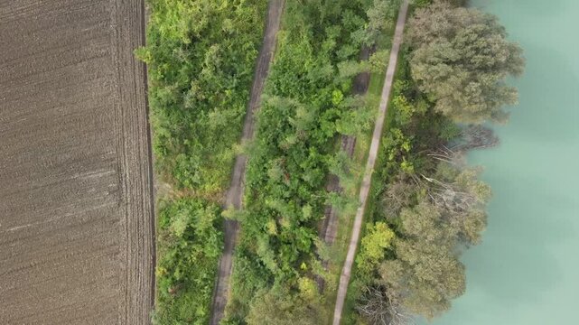 Aerial nature top down near Colico village farm Lake Como Italian Alps mountains in Lombardy