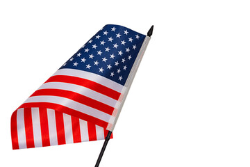 Stars striped blue red white flag of United States with black plastic post tilted forward and with...
