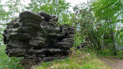 Seven Brothers and One Sister, remnants of rock at top of Semibratskaya Mountain in Middle Urals,...