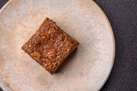 Chocolate brownie cake, food, sweet dessert with nuts rectangular shape. Sweet chocolate brownie