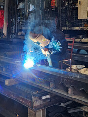 engineer welding iron