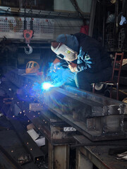 engineer welding iron