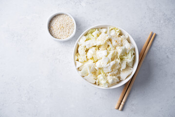Sesame seeds cabbage asian salad in a bowl