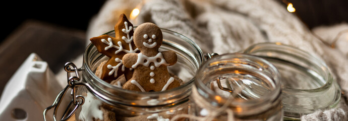 Banner. Big glass jar with homemade gingerbread cookies for Santa Claus. Idea for handmade present,...