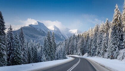 winter scene depicts a snowy road winding through frosted evergreen forest toward distant peaks