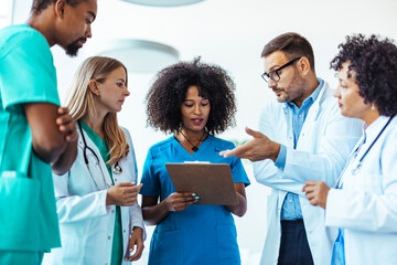 Diverse Medical Team Collaborating During a Detailed Patient Case Discussion