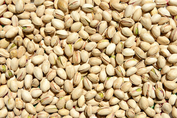 Pistachios texture and background . Tasty pistachios as background, as pistachios texture. Flat lay