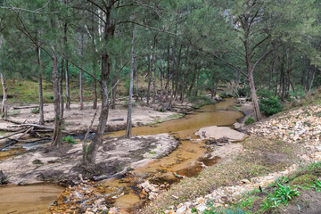Photograph of the Capertee River at very low levels running through the Capertee Valley after major flood damage in the Wollemi National Park in NSW, Australia.