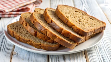 Sliced brown bread on a plate