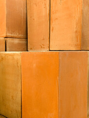 Handmade pots of rectangular and elongated shape. Textured clay pots. Vertical photography.