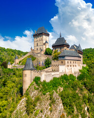 Karlstejn Castle surrounded by hills and forests. Central Bohemia, Czech Republic