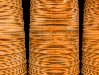 Clay pots with circular patterns and texture.