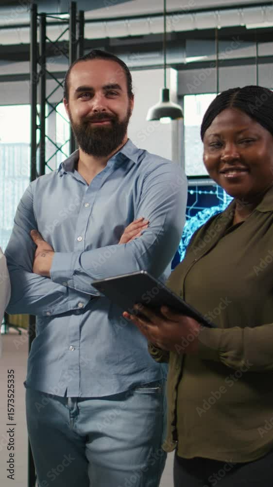 Poster vertical video portrait of happy teamworking engineers writing code, developing machine learning api