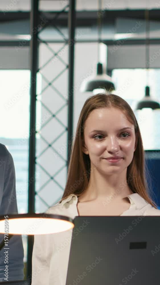Fototapete vertical video portrait of smiling teamworking programmers utilizing ai to optimize performance and 