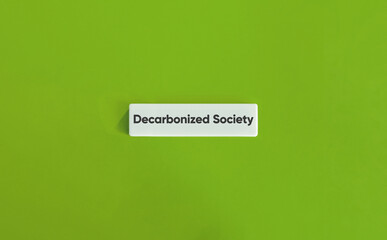 Decarbonized Society Message on Minimal Wide Letter Tile with Green Backdrop