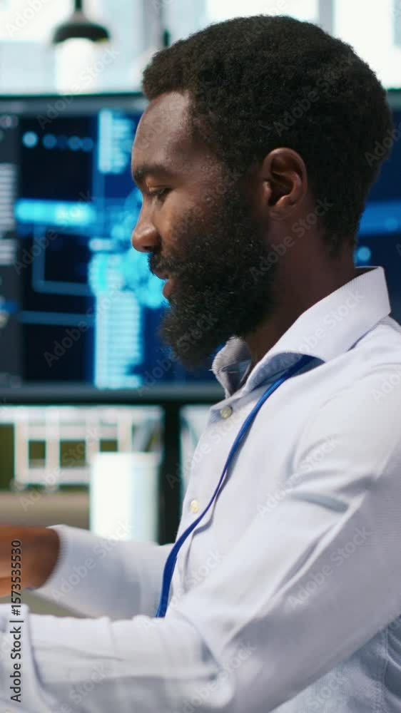 Poster vertical video technician using pc to code, testing applications to minimize bugs, improving system 