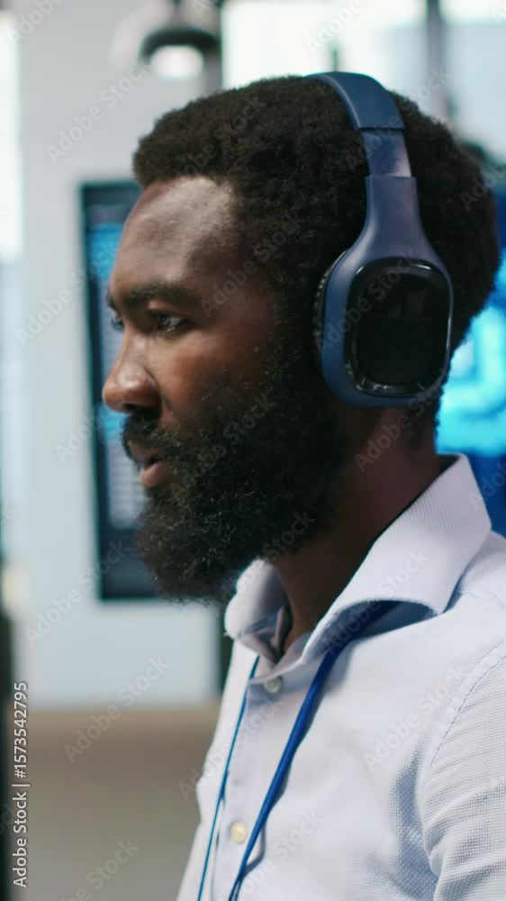 Poster vertical video computer scientist in office integrating ai machine learning systems to streamline wo