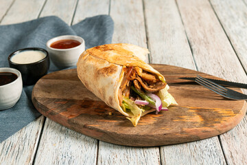 Delicious Wrap Served With Tangy Dipping Sauces