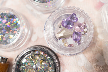 Decorative nail art gems and beads for beauty treatment at home nail salon fashion accessories enhancing style and creativity in personal care routines