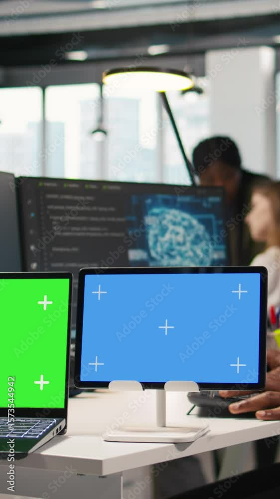 Poster vertical video software developer using ai on isolated screen laptop and tablet to optimize performa