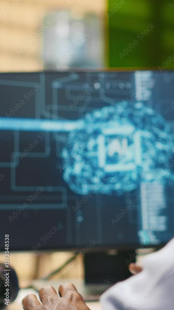 Poster vertical video technician in wheelchair using ai on computer to optimize performance and forecast is