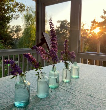 Blue Glass Bottles with Purple Flowers