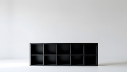 Black silhouette of a minimal rectangular shelf with one open cubby centered, surrounded by darkened compartments on a pure white background, evoking mystery, order, and modern simplicity