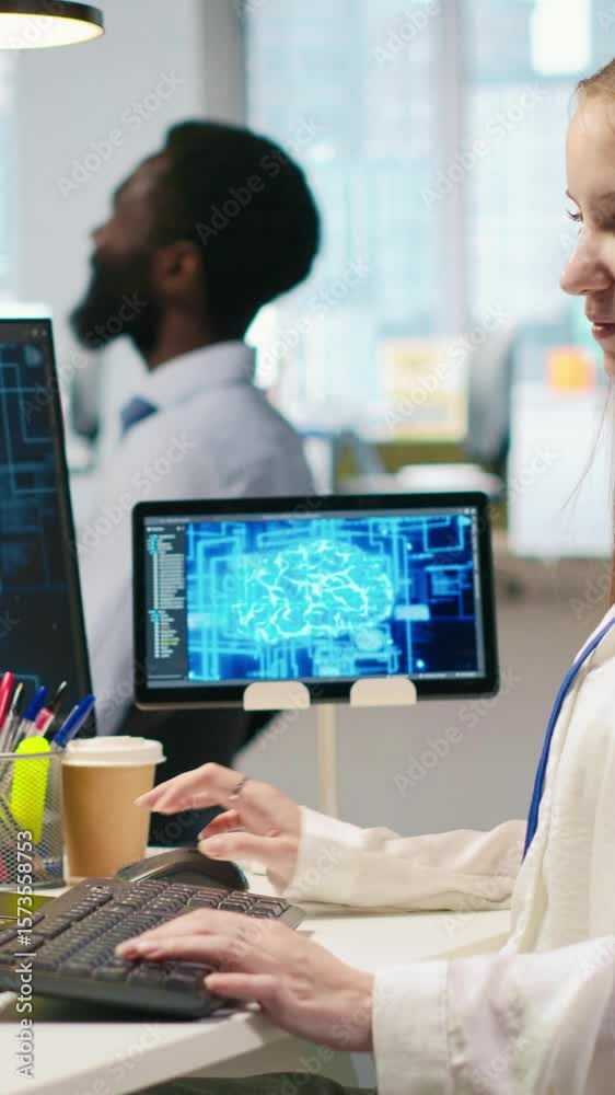 Poster vertical video it expert in high tech startup office uses neural networks to develop artificial inte