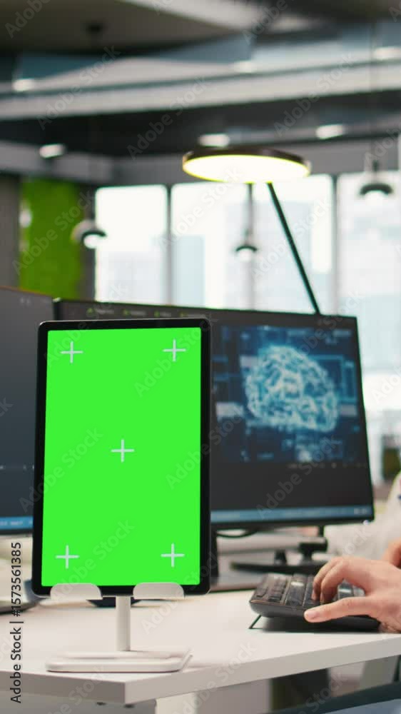 Poster vertical video startup technician using isolated screen tablet, developing artificial intelligence m