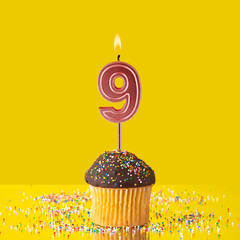 Birthday on a yellow background - Number 9 candle