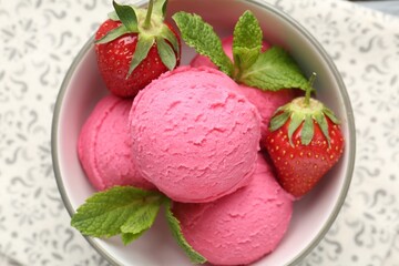 Tasty sorbet with strawberries and mint served on table, top view
