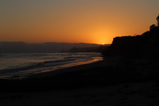 Golden hour sunset along mexico coastline ocean in Rosarito Mexico