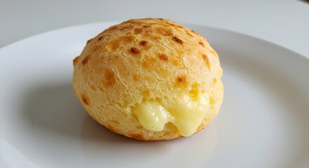 Delicious Golden Cheese Bread With Melted Gooey Filling Served On A White Plate A Mouthwatering Baked Treat