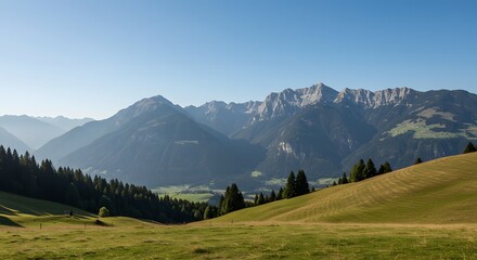 Expansive Green Alpine Meadow Under Clear Blue Sky With Majestic Snow Capped Mountain Range In The Distance