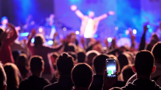 RASNOV, ROMANIA - JULY 15, 2018: Crowd party dance at the concert, free entry public event