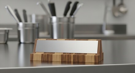 Modern kitchen stainless steel utensils and wood knife block, clean setting