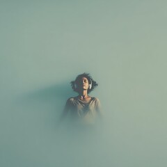A woman with closed eyes stands immersed in a misty, calm environment, evoking tranquility and introspection.