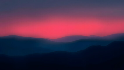 Obraz premium Golden hour light bathes the majestic mountain landscape, casting a beautiful array of orange, red, and blue across the sky as the sun rises or sets