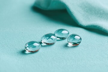 Serene Aqua Spheres on a Peaceful Fabric Setting