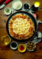 The best and most perfect pizza in the world, in portrait format, top view, and fine art. Chicken with catupiry cheese.