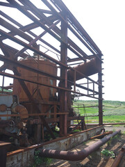 Rusty steampunk pipes on abandoned powerplant