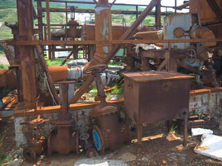 Rusty steampunk pipes on abandoned powerplant