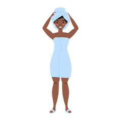 Woman in light blue towel smiling with towel wrapped on her head after shower