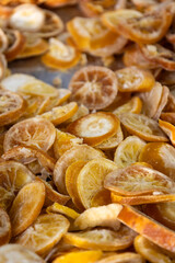 Dried and caramelized citrus fruits. Citrus food for desserts and beverages.