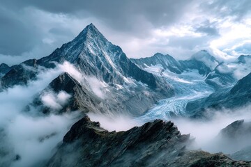 Majestic mountain range shrouded in clouds