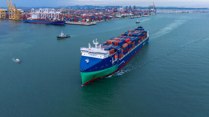 Aerial view from drone, Container ship or cargo shipping business logistic import and export freight transportation by container ship in open sea, Container loading cargo freight ship boat.