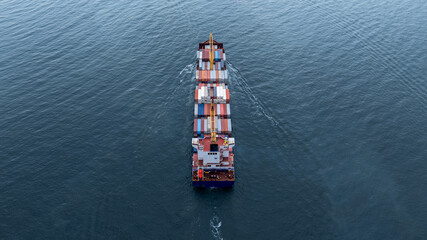 Aerial view from drone, Container ship or cargo shipping business logistic import and export freight transportation by container ship in open sea, Container loading cargo freight ship boat.
