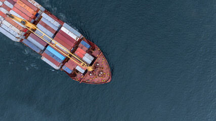 Aerial view from drone, Container ship or cargo shipping business logistic import and export freight transportation by container ship in open sea, Container loading cargo freight ship boat.