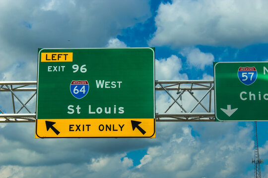 Road travel banner. A highway exit sign for Interstate 64 in Illinois for St Louis, Missouri. Midwest design element.